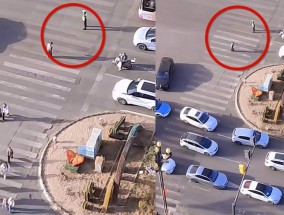 西宁一交警化身“人墙”车流中护送老人被爆赞，当事人发声：全程十分钟，已帮助四年